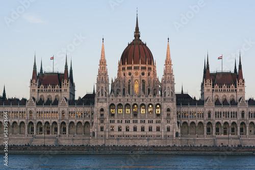 The last rays of sun illuminate the Hungarian Parliament building in Budapest
