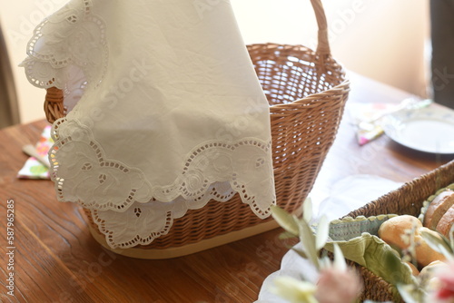 Close-up of Easter breakfast table with traditional slovenian dishes. Ham, colorful eggs, potica and horseraddish.