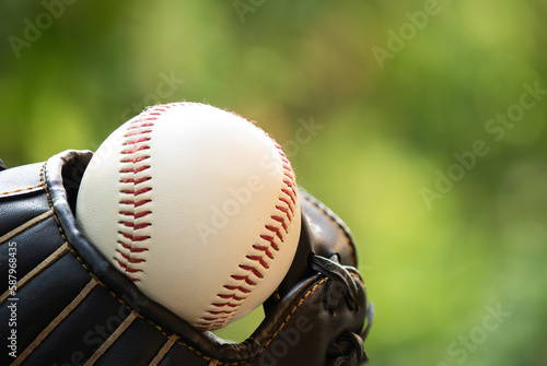 Baseball equipment on nature background.