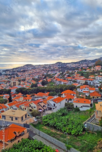 A beautiful view from a height of the houses on the slope of the island of Madeira.