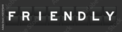 Black color analog flip board with word friendly on gray background
