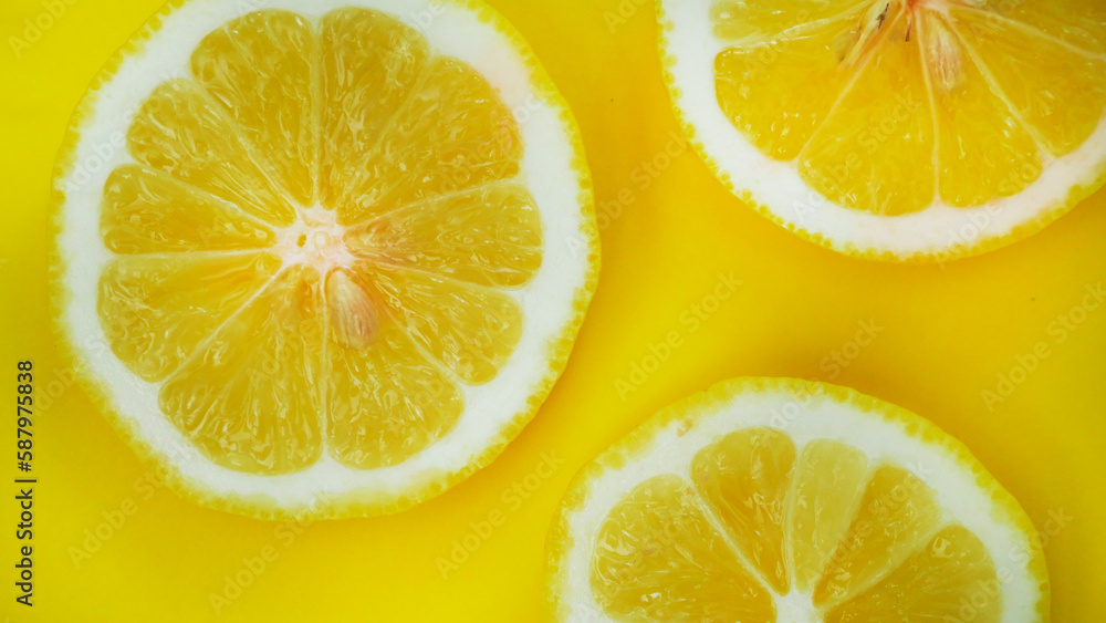 lemon slices on a yellow background