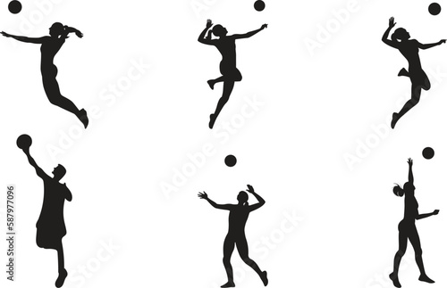 silhouettes of people  playing volleyball