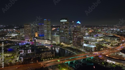 Wallpaper Mural View from above of brightly illuminated high skyscraper buildings in downtown district of Tampa city in Florida, USA. American megapolis with business financial district at night Torontodigital.ca