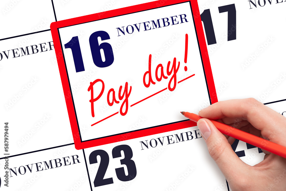Hand writing text PAY DATE on calendar date November 16 and underline it. Payment due date Hand writing text PAY DATE on calendar date November 16 and underline it. Payment due date