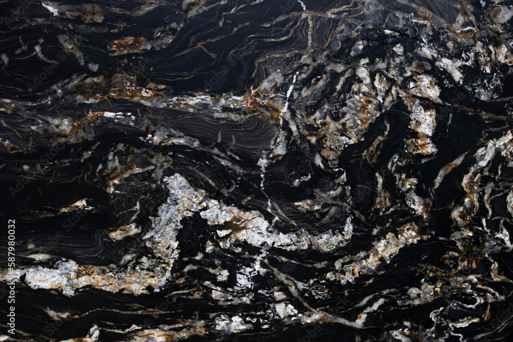 Black spanish matt granite slab with gold blured waved lagoon Belvedere Extra close up Black spanish matt granite slab with gold blured waved lagoon Belvedere Extra close up