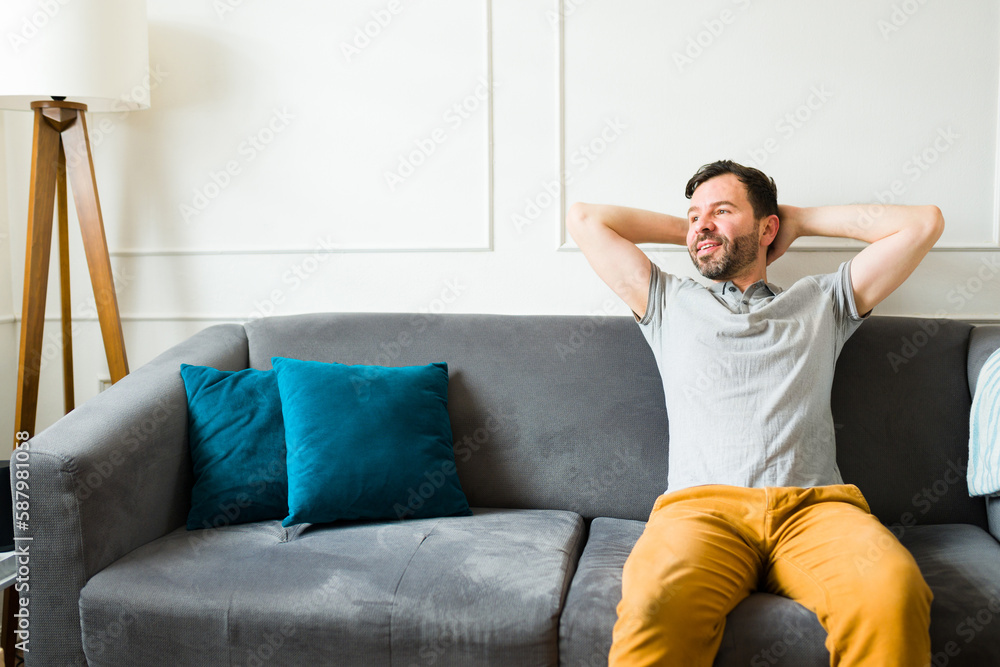 Relaxed caucasian man enjoying his leisure time at home Relaxed caucasian man enjoying his leisure time at home