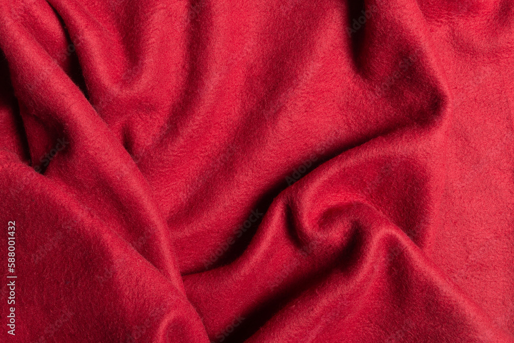 Top view red fleece fabric with creases Top view red fleece fabric with creases