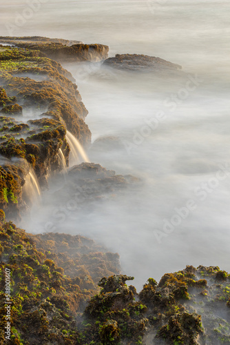 waves crashing on rocks