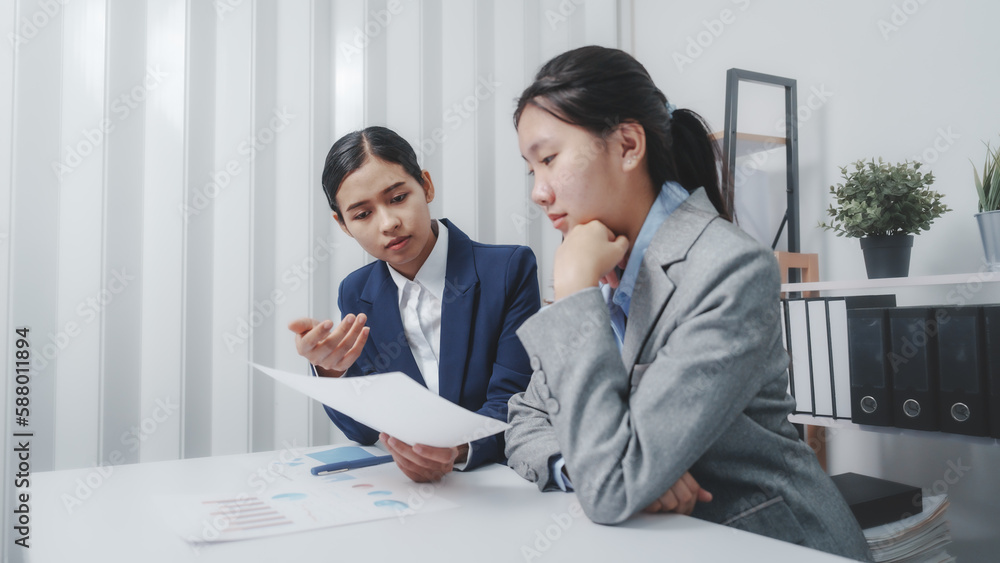 Young Asia female leader business woman coaching new smes bookkeeping audit accounting interview with trainer training business job. Young Asia female leader business woman coaching new smes bookkeeping audit accounting interview with trainer training business job.