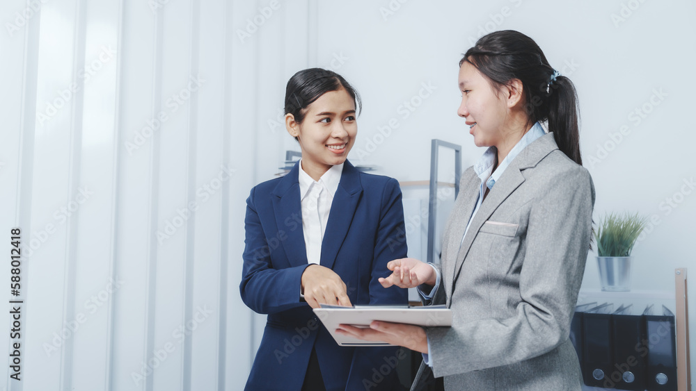 Young Asia female leader business woman coaching new smes bookkeeping audit accounting interview with trainer training business job. Young Asia female leader business woman coaching new smes bookkeeping audit accounting interview with trainer training business job.