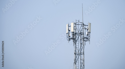 Telecommunication tower. Antenna on gray sky. Radio and satellite pole. Communication technology. Telecommunication industry. Mobile or telecom 5g network. Network connection business background.