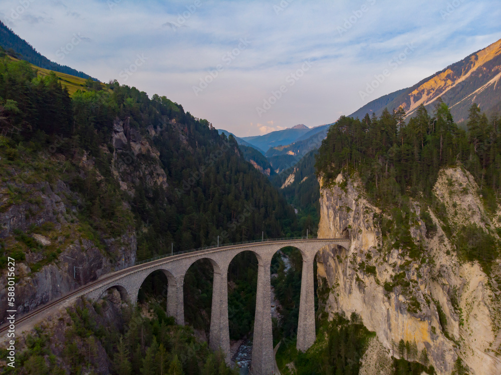 Aerial view of the famous red train on the Landwasser Viaduct, Switzerland.