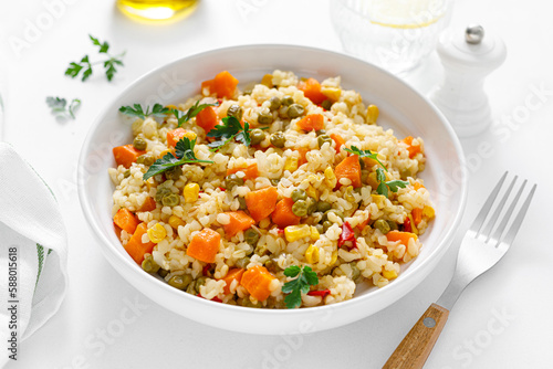 Bulgur with vegetables and fresh parsley