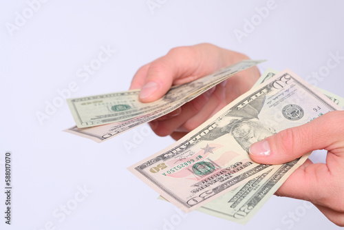 Female hand holds american dollars