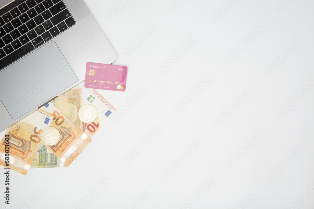 euro and bitcoin banknotes, cryptocurrency and blockchain concept on white background flat lay euro and bitcoin banknotes, cryptocurrency and blockchain concept on white background flat lay