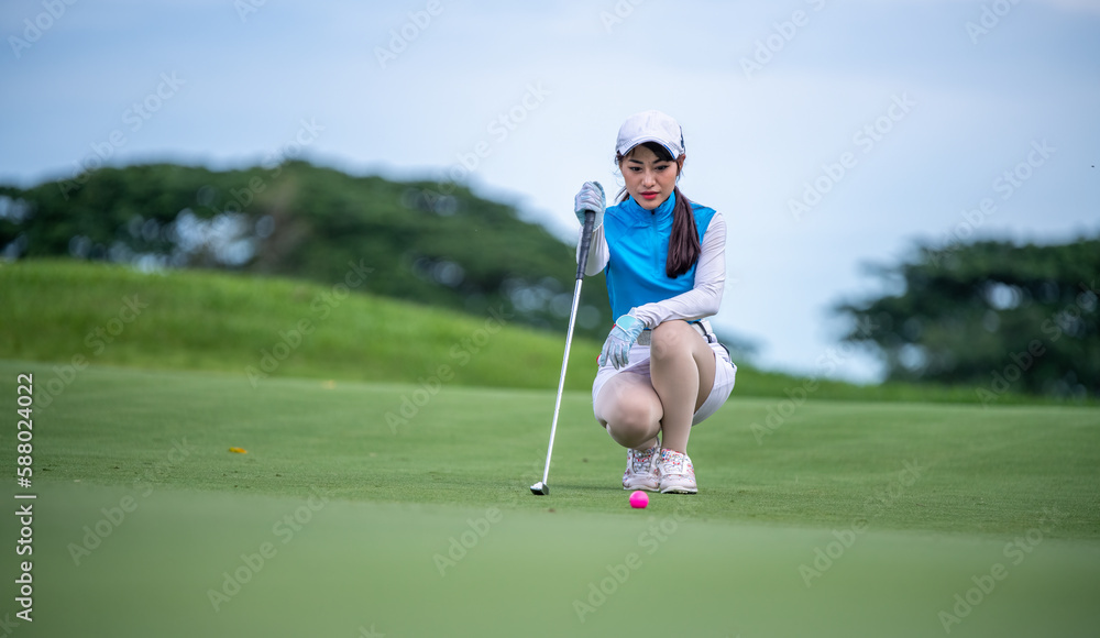 Professional golfer checking fairway and teeing golf in golf tournament competition at golf course for winner. Professional golfer checking fairway and teeing golf in golf tournament competition at golf course for winner.