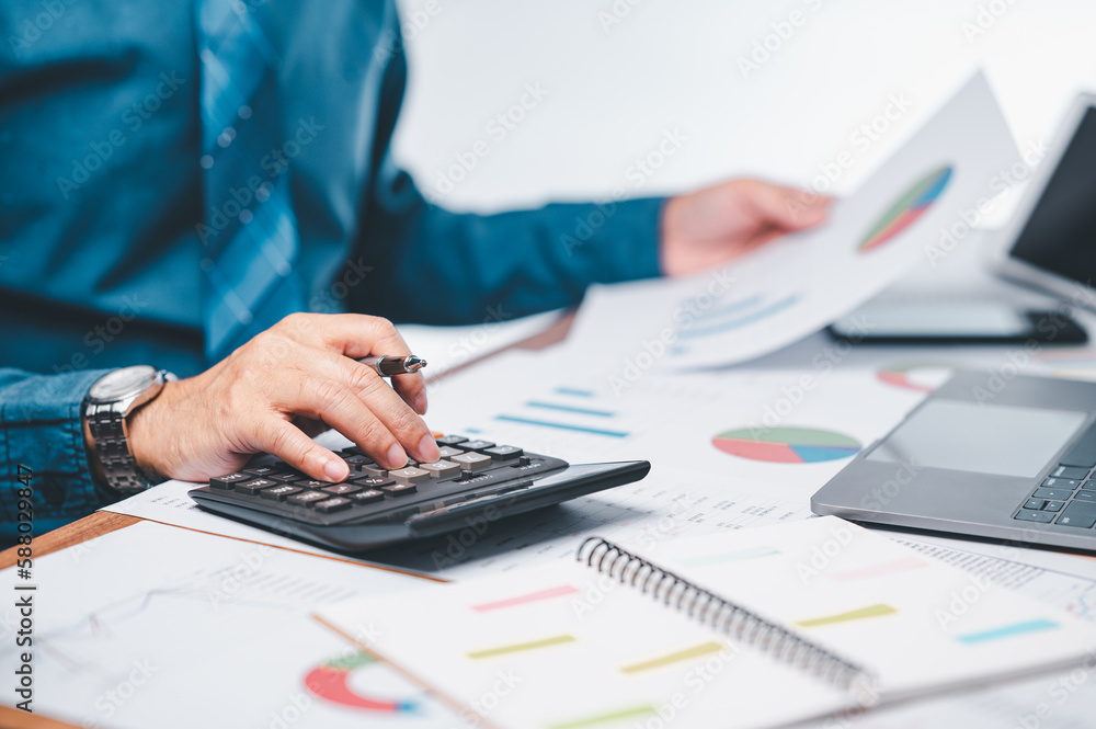 businessman is meticulously calculate financial projections, marketing strategies while working on necessary paperwork, planning, in order to ensure success of project, accuracy of financial report businessman is meticulously calculate financial projections, marketing strategies while working on necessary paperwork, planning, in order to ensure success of project, accuracy of financial report