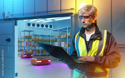 Warehouse automation. Man w...