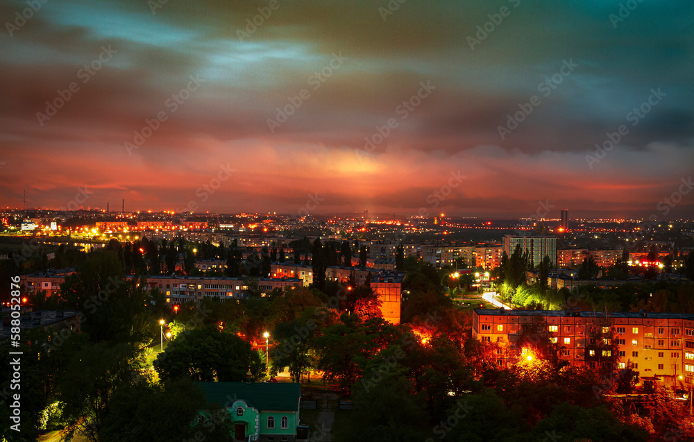 Night glow of an industrial city in one of the countries of Eastern Europe