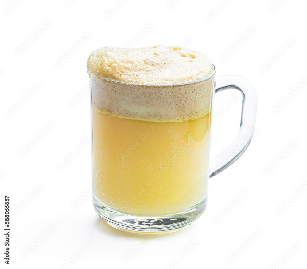 Homemade fresh squeezed fruit juice in a clear glass isolated on white Homemade fresh squeezed fruit juice in a clear glass isolated on white