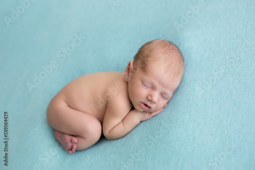 sleeping newborn lies on his stomach. bundle of happiness