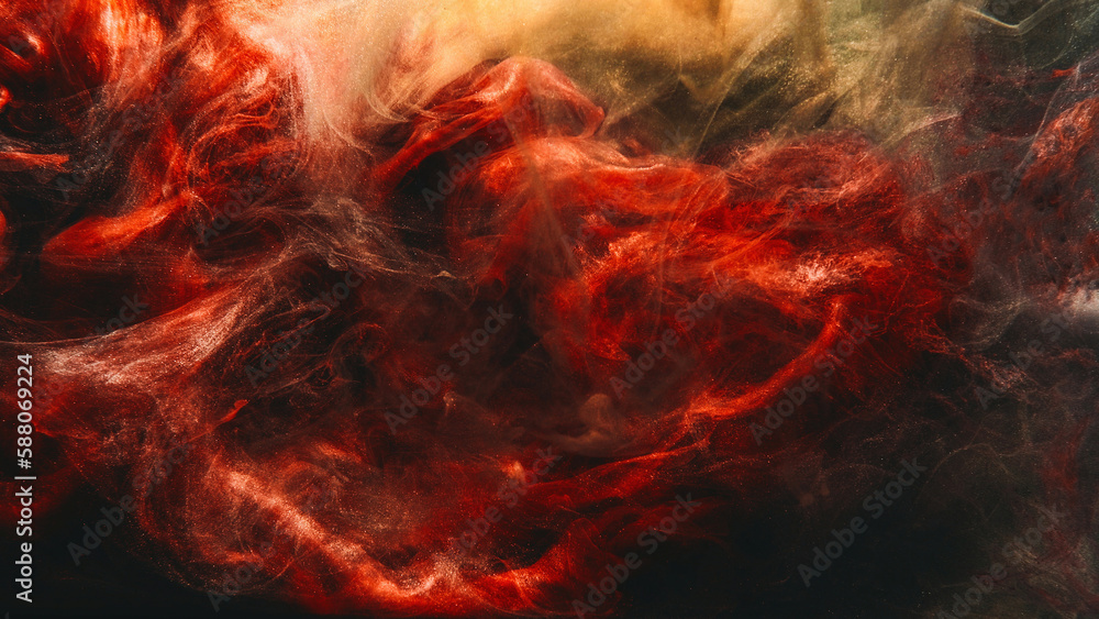 Paint water. Color smoke. Underwater explosion. Red golden glowing glitter fluid splash vapor cloud on dark black abstract art background.