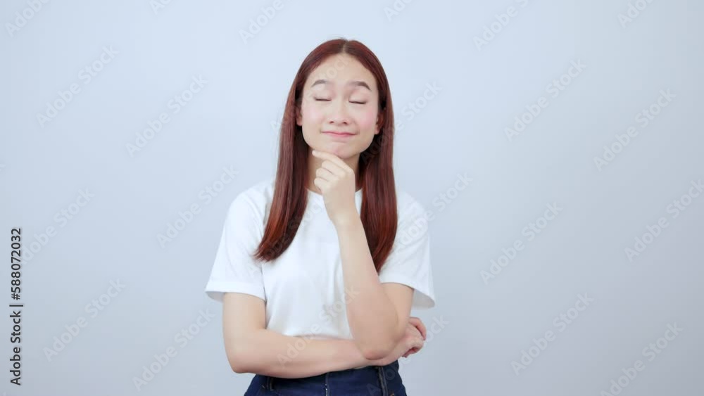 Smiling female manager standing with arms crossed looking at camera Smiling female manager standing with arms crossed looking at camera