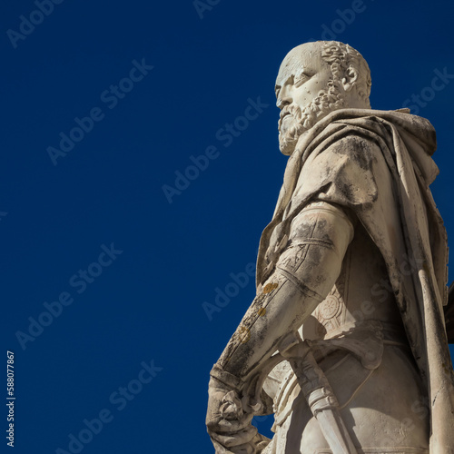 Cosimo I de Medici, Grand Duke of Tuscany. A marble statue erected in 1596 in the historical center of Pisa (with blue sky and copy space)