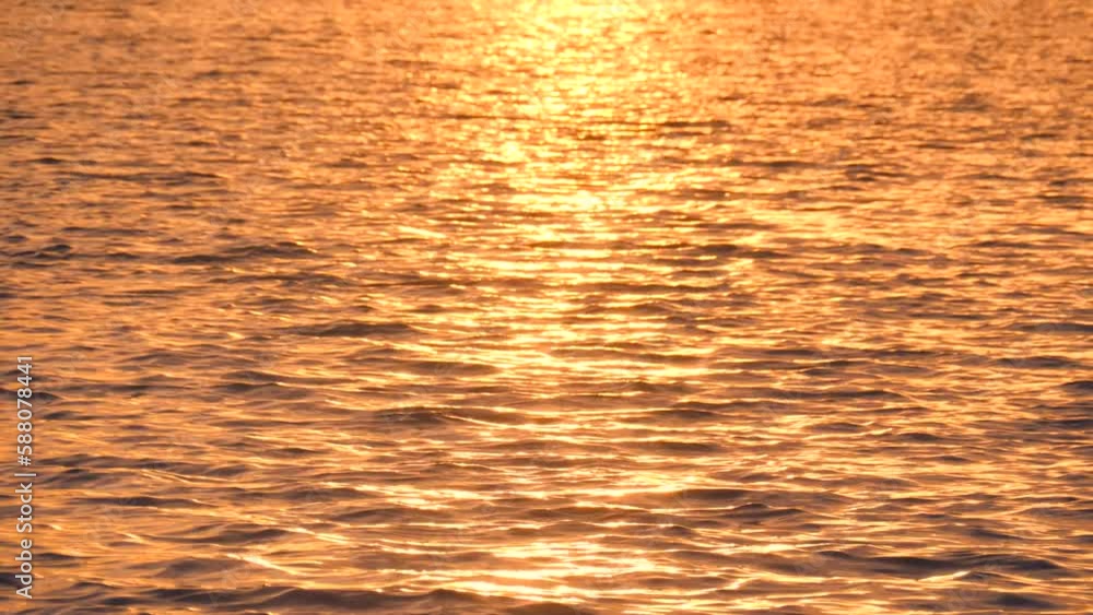 Calm water. Calm ocean water at sunset. Sun reflection on water surface. Calm water. Calm ocean water at sunset. Sun reflection on water surface.