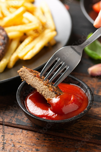 Peppered Vegetarian steaks served with french fries and salad photo