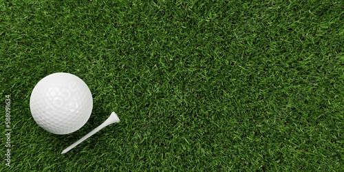 Single white golf ball with white tee next to it on green grass background with copy space top view from above