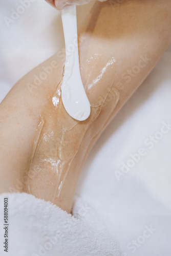 shaving arms with laser. beauty treatment