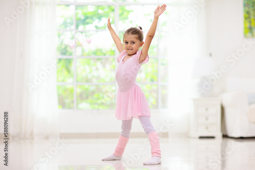 Baby ballet. Little ballerina girl in dance class.