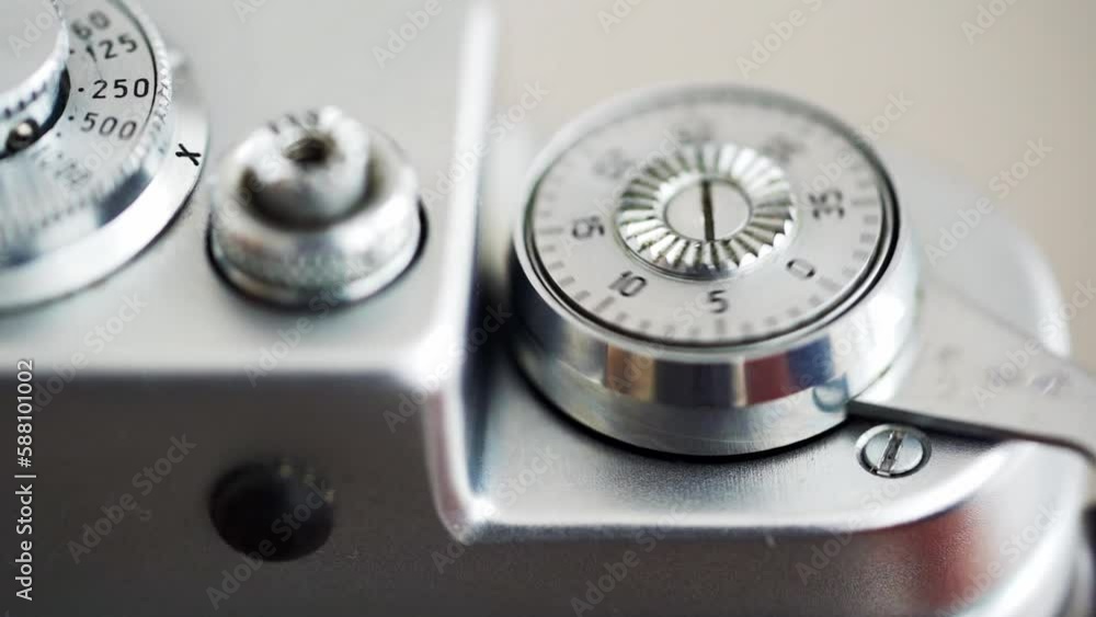 The lever for advancing the film of the camera to the cocking of the