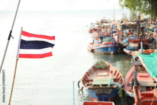 Thailand flag blur fishing boats background 