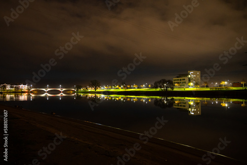 House near the river in the night