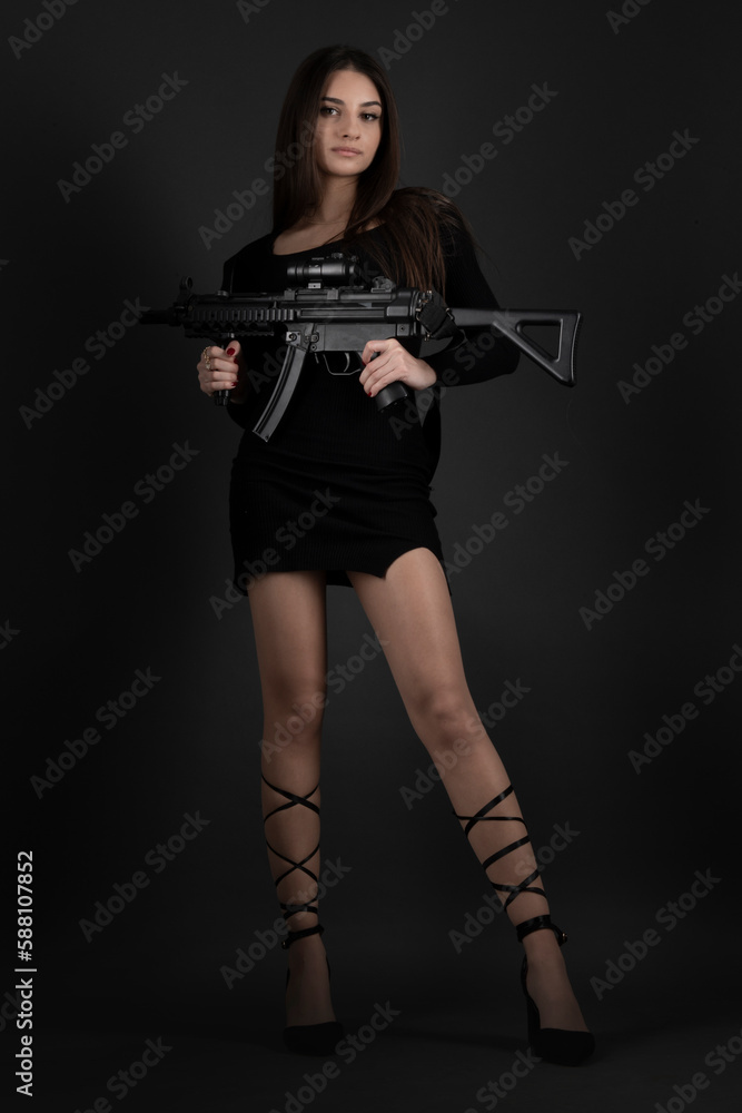Young Woman With Hand Gun Young Woman With Hand Gun