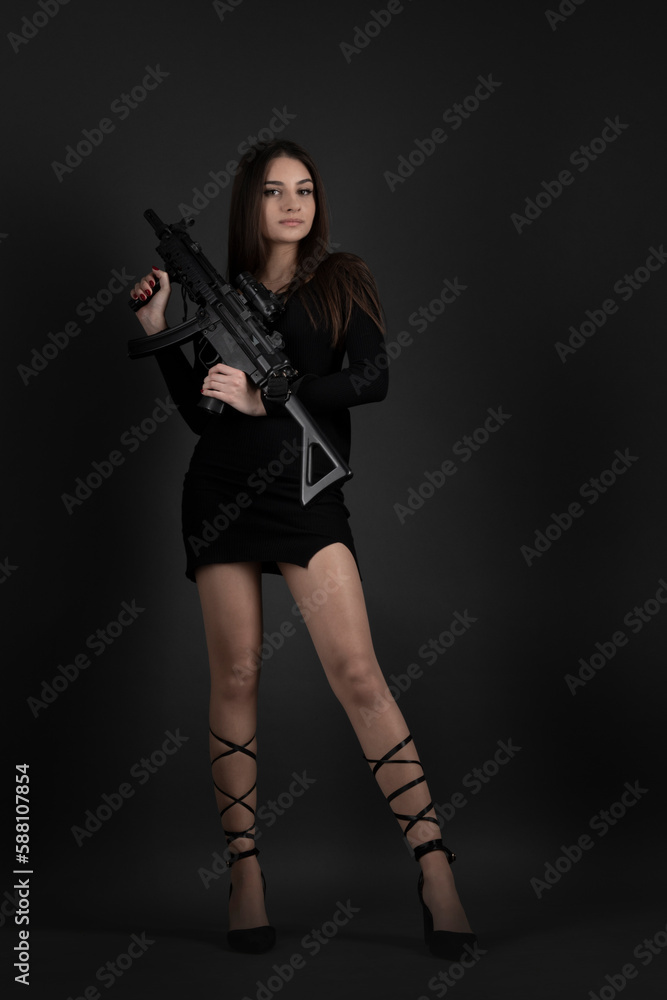 Young Woman With Hand Gun