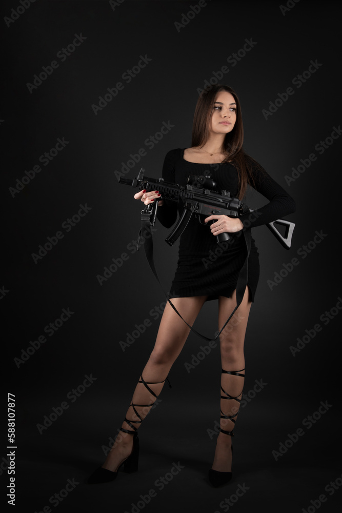 Young Woman With Hand Gun Young Woman With Hand Gun