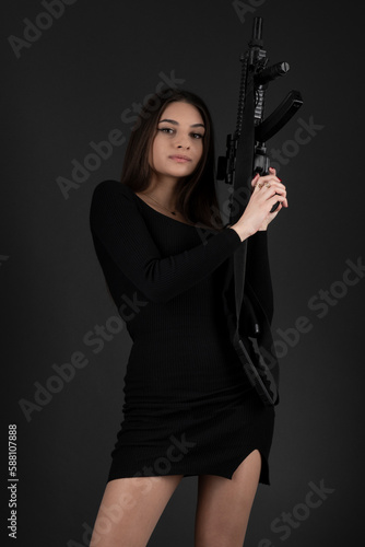 Young Woman With Hand Gun