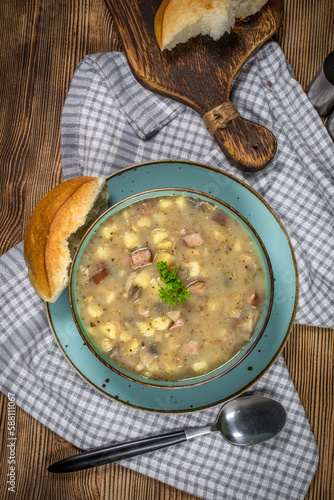 Traditional polish soup Zurek in ceramic bowl.