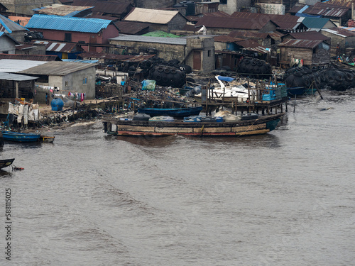 Top view of Lagos biggest slum, Makoko. Makoko is home to over 100,000 residents and this was shot in Lagos, Nigeria. August 23 2022 © manola72
