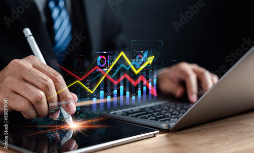 Businessman management finance and investment concept, Capital gain world money economic growth. coin stack financial graph chart, market report on cash currency, Stock market instability concept.