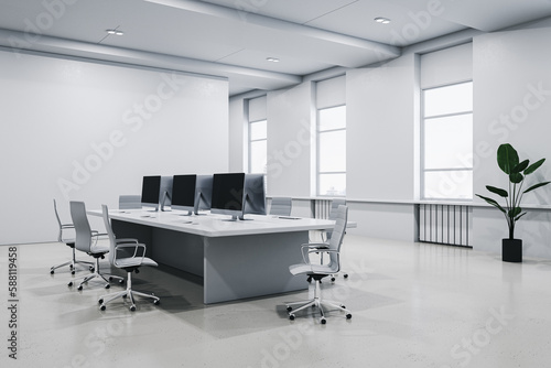 Modern concrete coworking office interior with furniture  equipment and window with daylight. 3D Rendering.