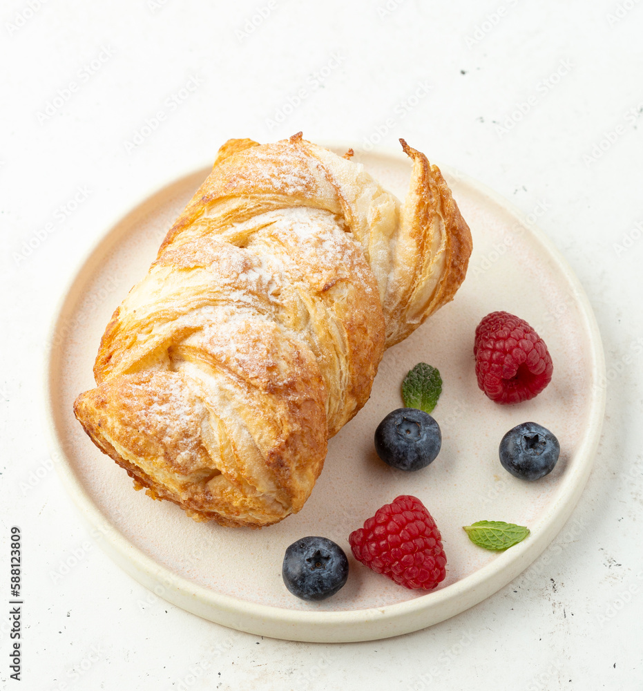 Puff pastry bun with berries Puff pastry bun with berries
