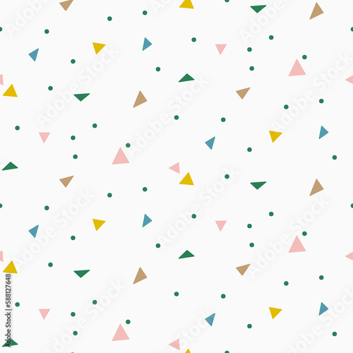 Colorful abstract confetti triangles seamless pattern background.