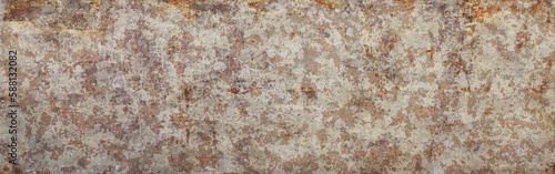 Rusty metal texture.Steel oxidizing background.Old metal with a damaged surface.