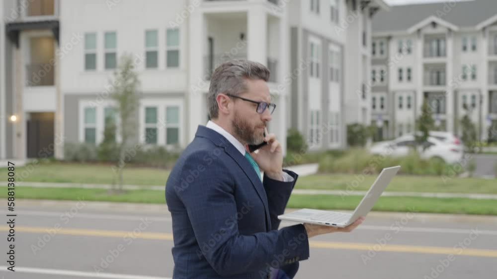 Running business man with laptop outdoor. Concept of running businessman with a laptop. Late business meeting. Worried businessman running on the way to office. Man in suit is late. Running business man with laptop outdoor. Concept of running businessman with a laptop. Late business meeting. Worried businessman running on the way to office. Man in suit is late.