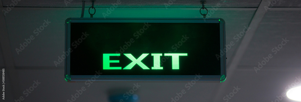 Fire exit sign at the corridor Fire exit sign at the corridor